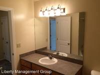 $1,749 / Month Apartment For Rent: 4821 SE Railroad Avenue - Liberty Management Gr...