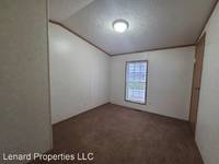 $700 / Month Apartment For Rent: 650 SE State Hwy 14 - Lot 12 - Lenard Propertie...