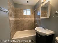 $1,200 / Month Apartment For Rent: 4610 W Eggert Place - Smart Asset Management LL...