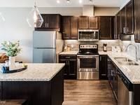 $1,440 / Month Apartment For Rent: Riverfront Views, Modern Convenience & Upsc...