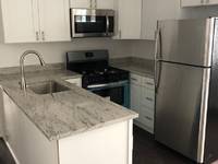 $2,500 / Month Apartment For Rent: 717 Kenyon St. NW 103 - Ernst Equities | ID: 11...