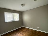 $1,050 / Month Apartment For Rent: 1061 E 80th St - 1061 E 80th #1N - KamBri Realt...