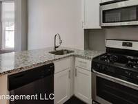 $1,000 / Month Apartment For Rent: 1705 St Paul St - #1 1st Floor Front - JBZ Mana...